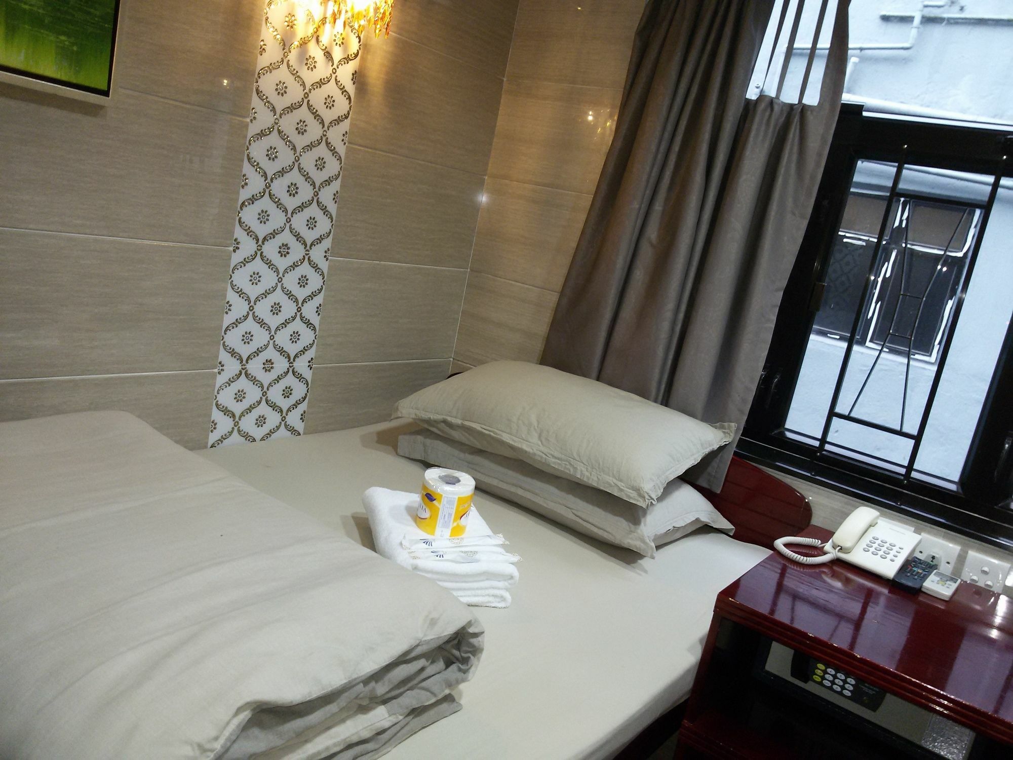 Asia Inn Цзюлун Экстерьер фото